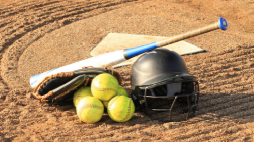 Softball equipment on field