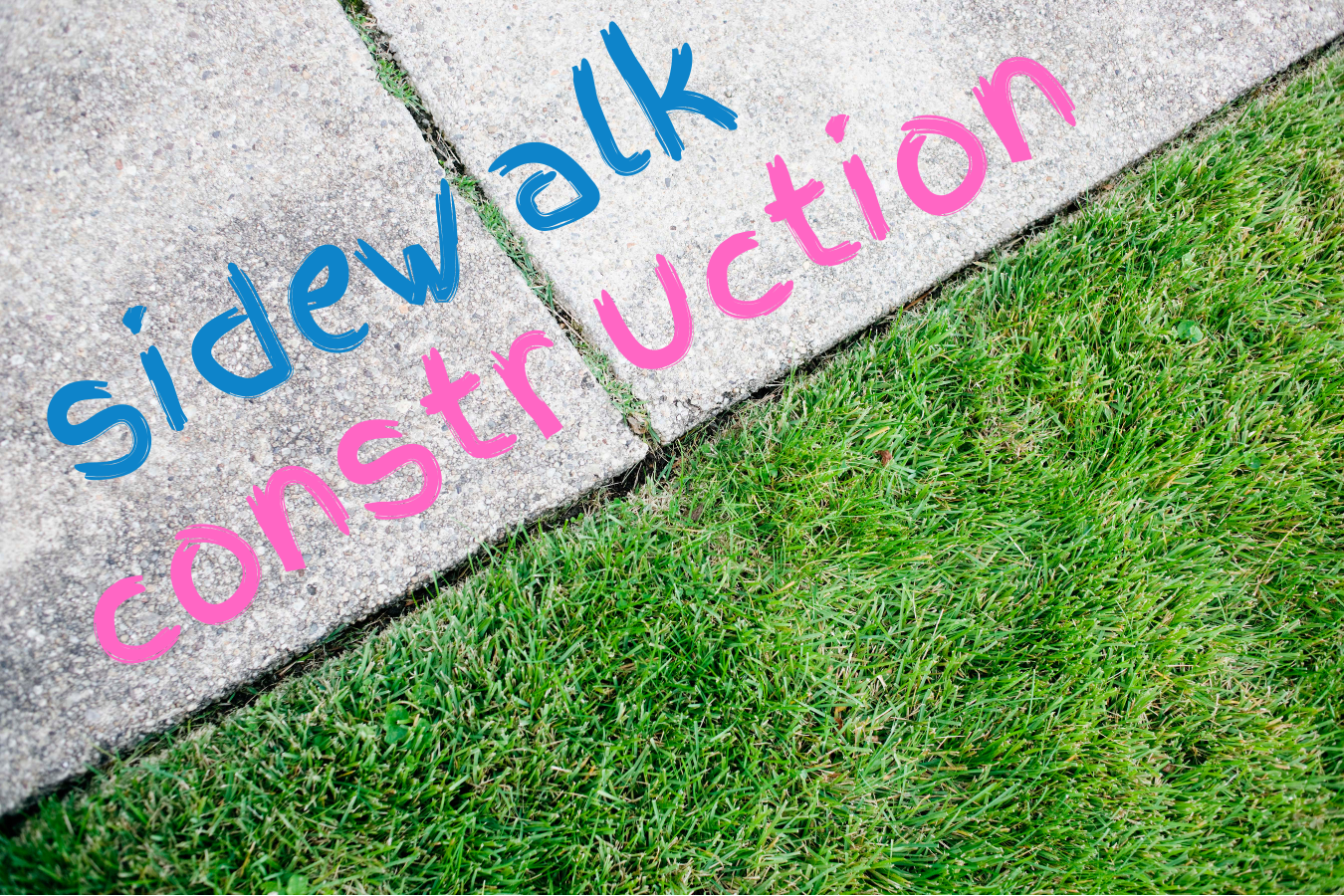 The words "sidewalk construction" are written in pink and blue chalk on a sidewalk