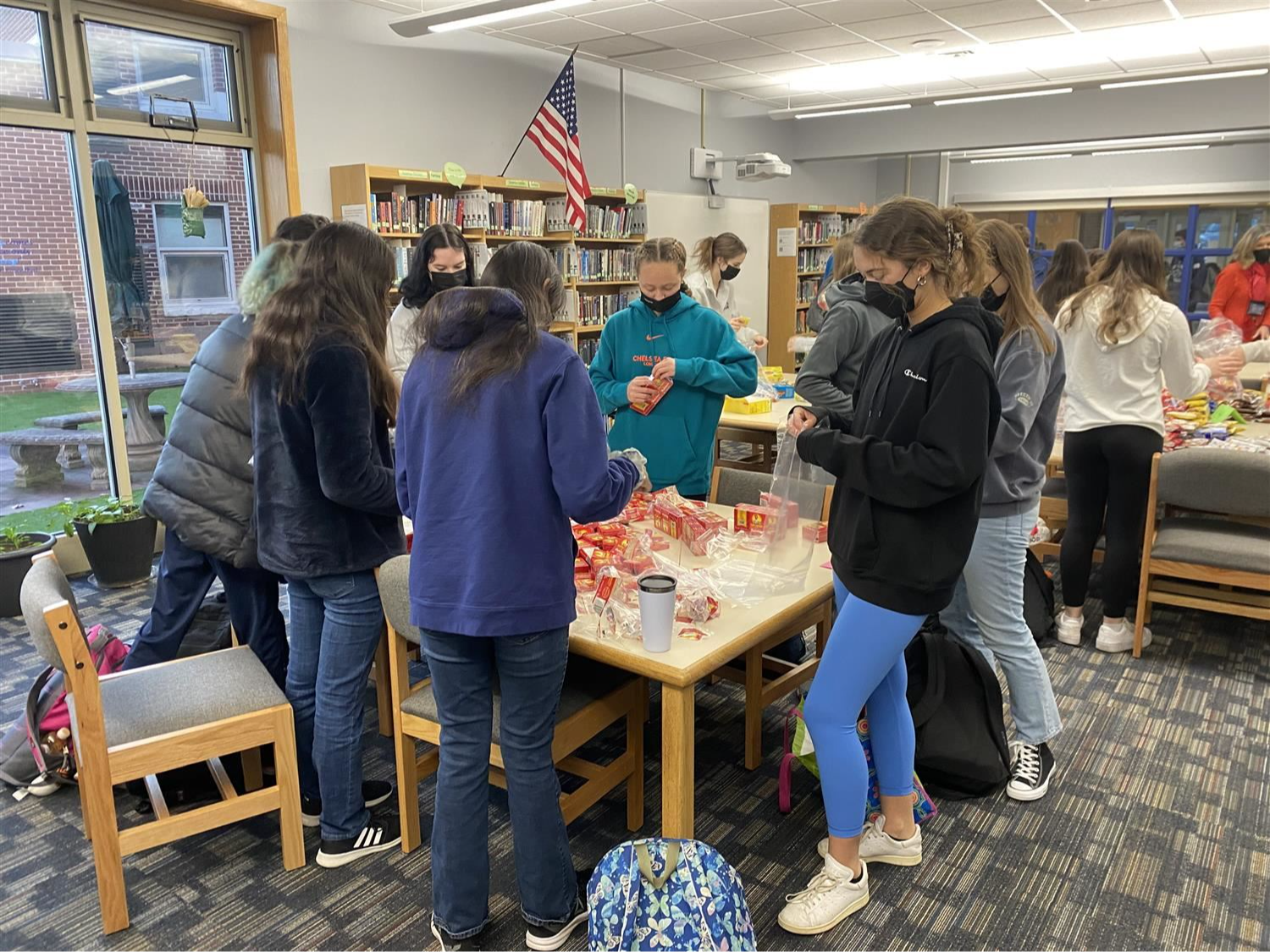 Key Club students working on a project