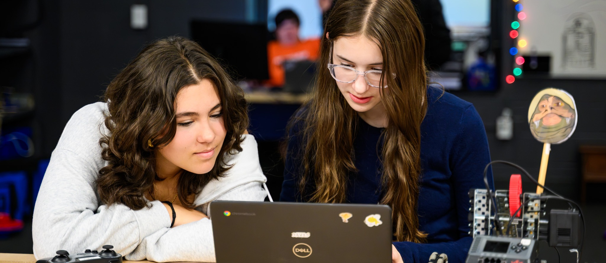 two students in STEAM Lab working at computer