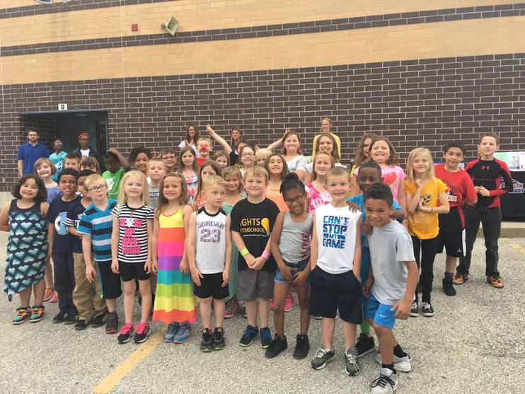 kids gathered outside the school