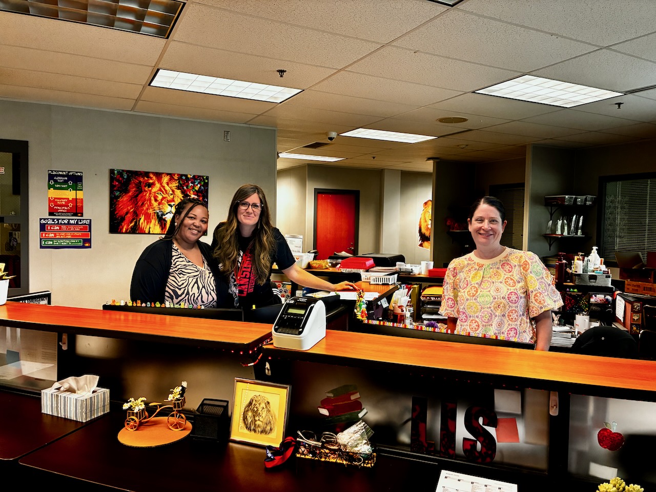 Front office staff smiling