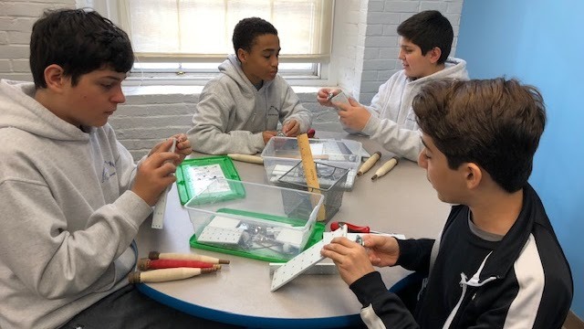 Group of students working together  in a project