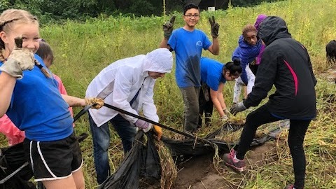 Sullivan MS Students Working in a field