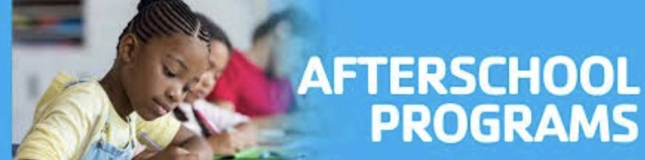 students in classroom writing 