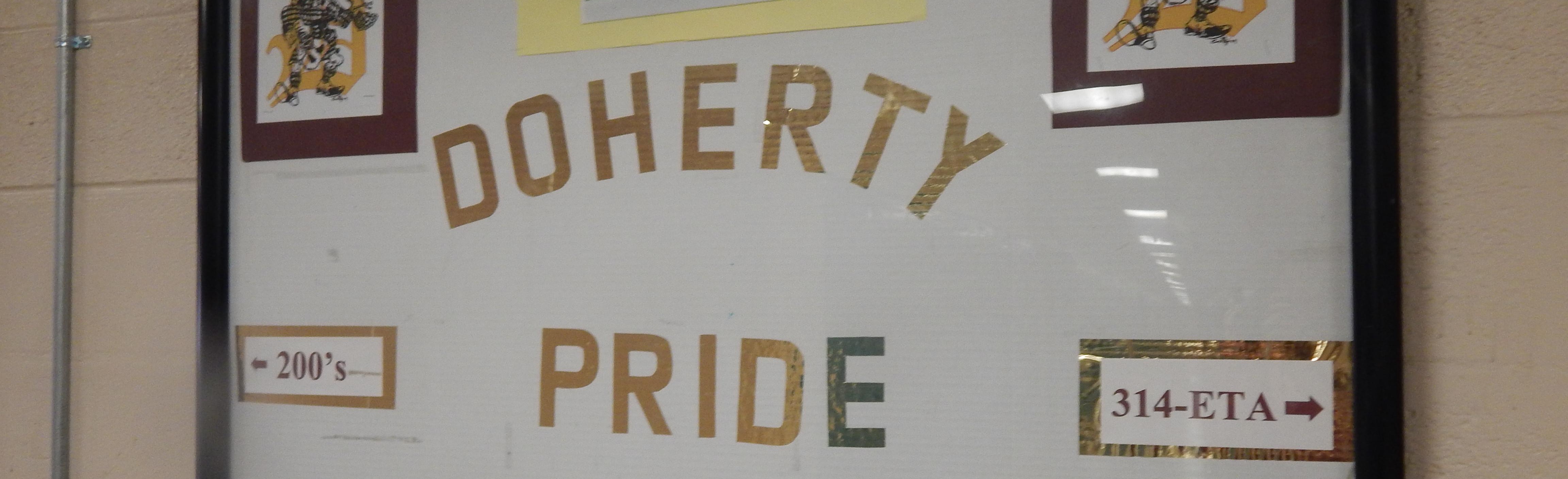 Whiteboard on the school's hallway "Doherty Pride" written on it 