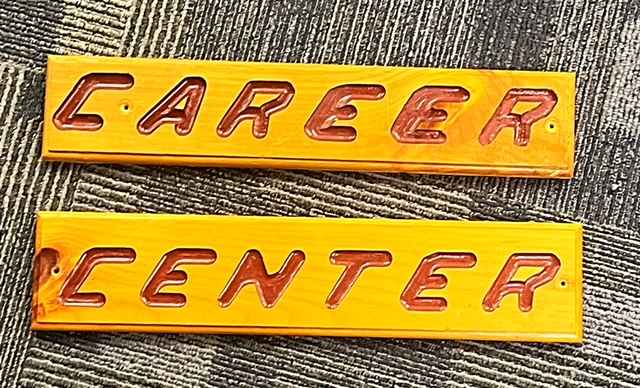 2-piece wooden sign that says Career Center