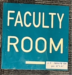 1-piece plastic sign that says Faculty Room