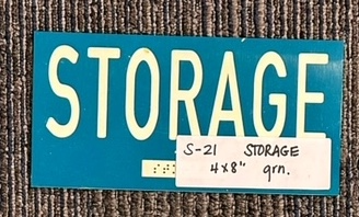 1-piece plastic sign that says Storage