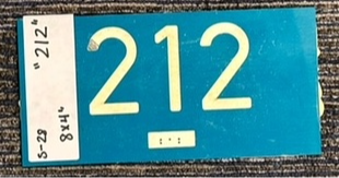 1-piece plastic sign that says 212