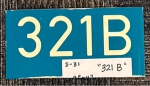 1-piece plastic sign that says 321B