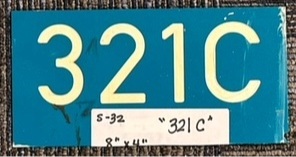 1-piece plastic sign that says 321C