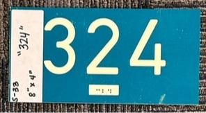 1-piece plastic sign that says 324