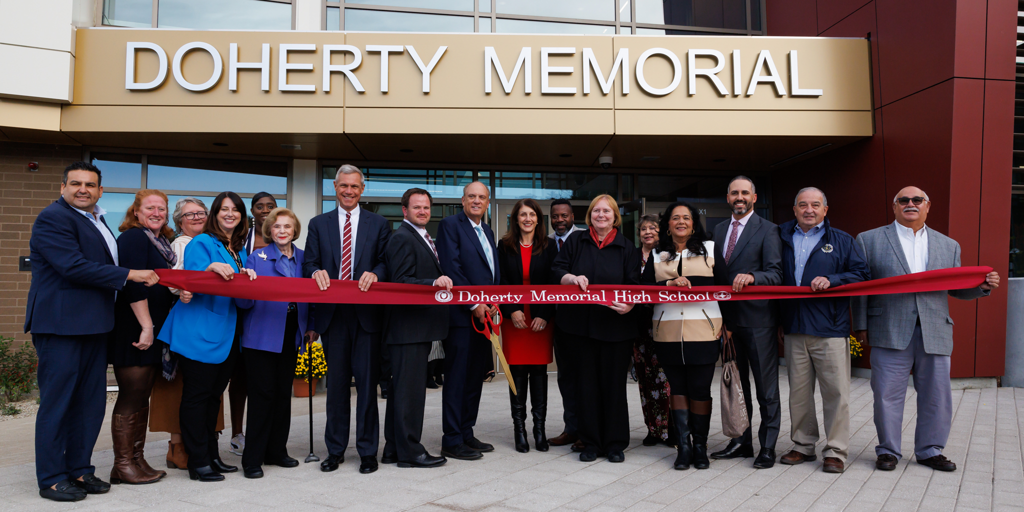 School, city and state officials cut the ribbon during the Doherty Memorial High School dedication ceremony on Thursday, October 17.