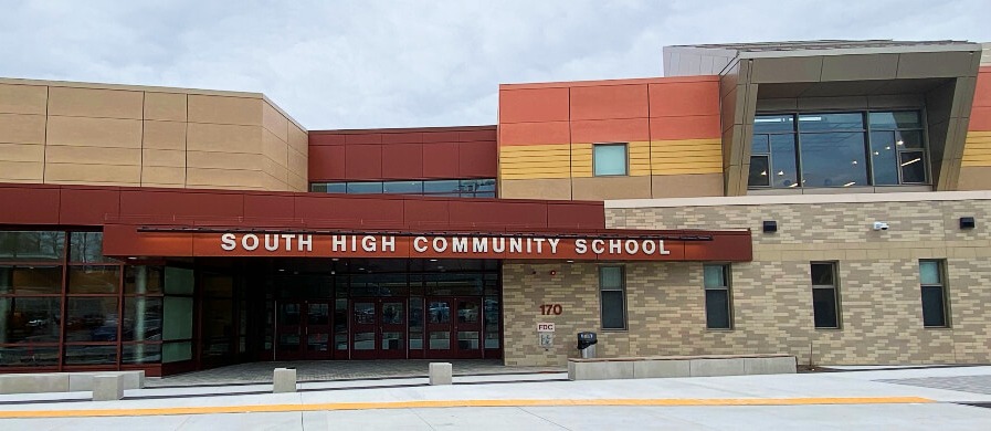 South High School Modern style red orange and tan building with "South High Community School" labeled above the entrance