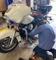 Student working a motorcycle