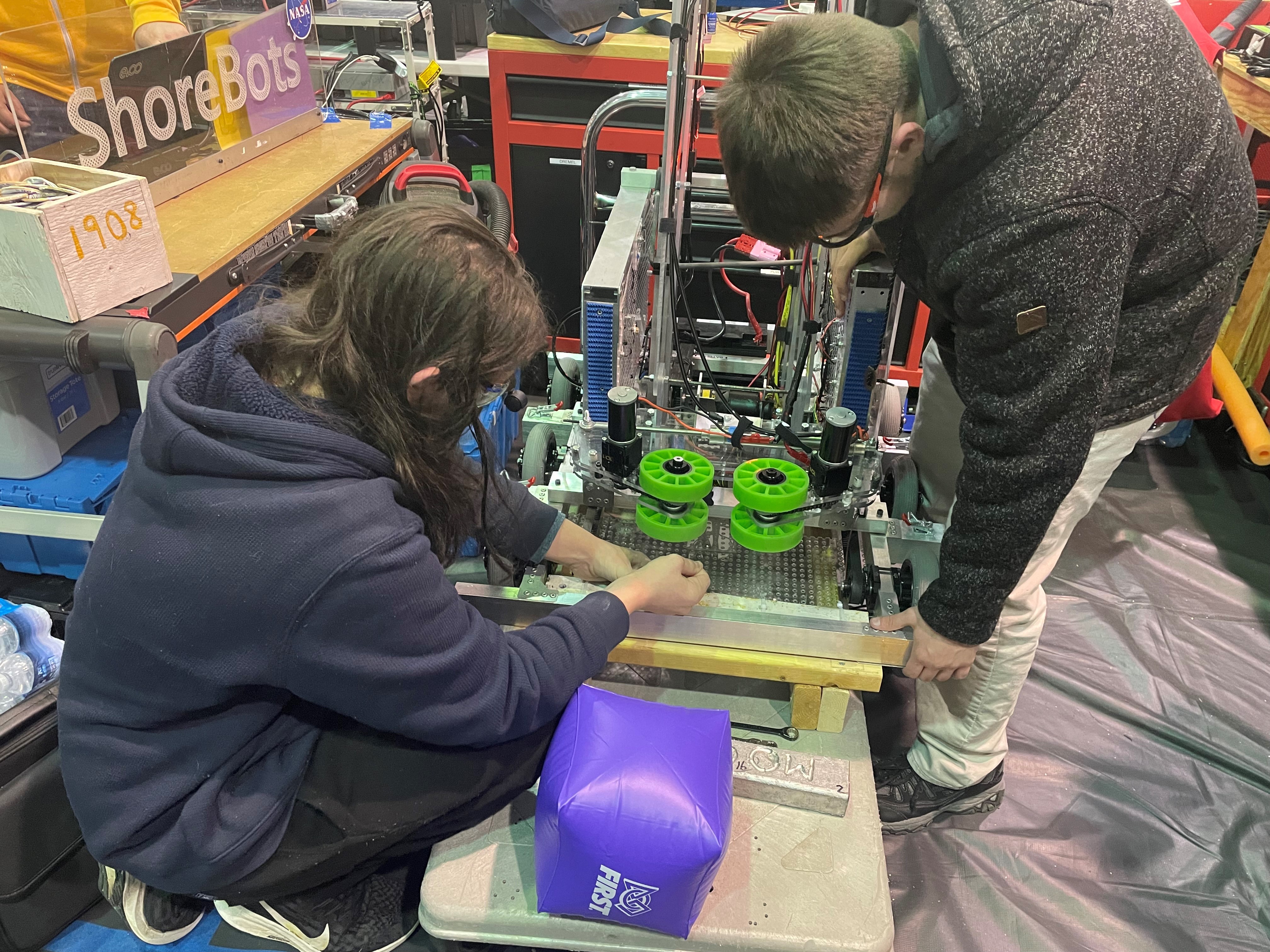 Students working on a robot