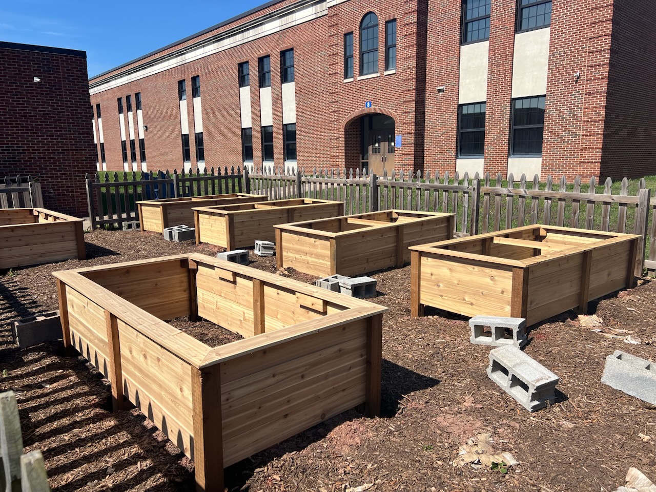 Garden boxes built by students for the community garden.