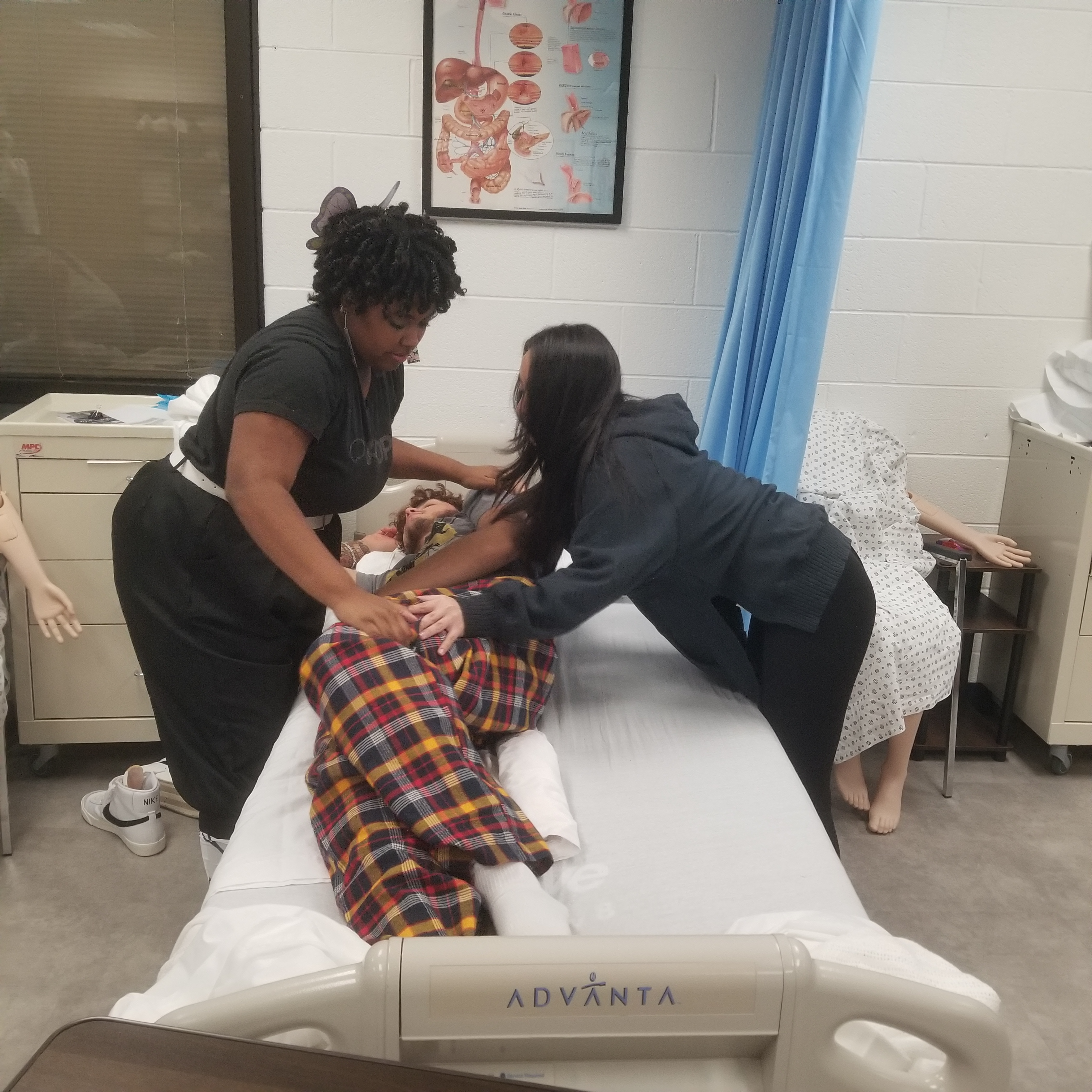 Students working on skills for EMT