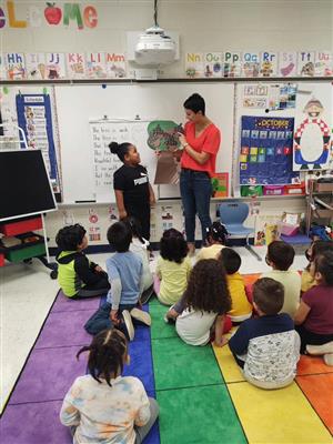 Teacher with students