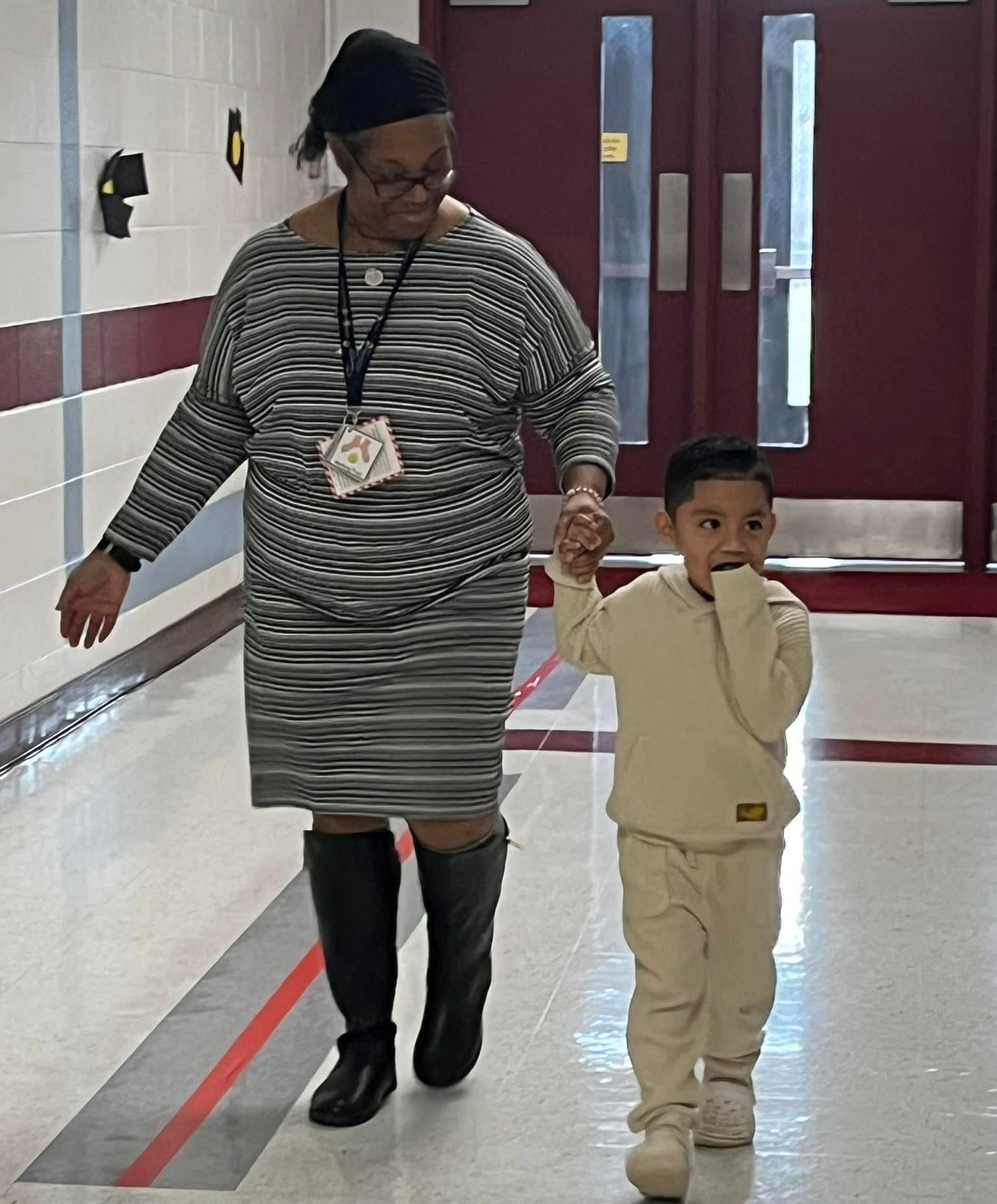 Teacher walking with student