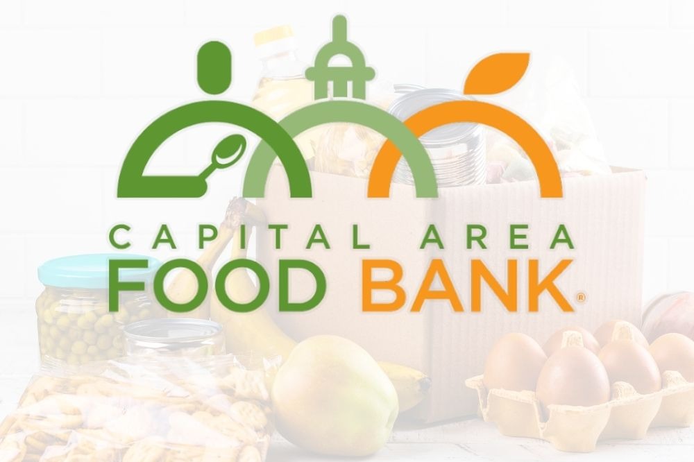 Capital Area Food Bank Logo with food in background