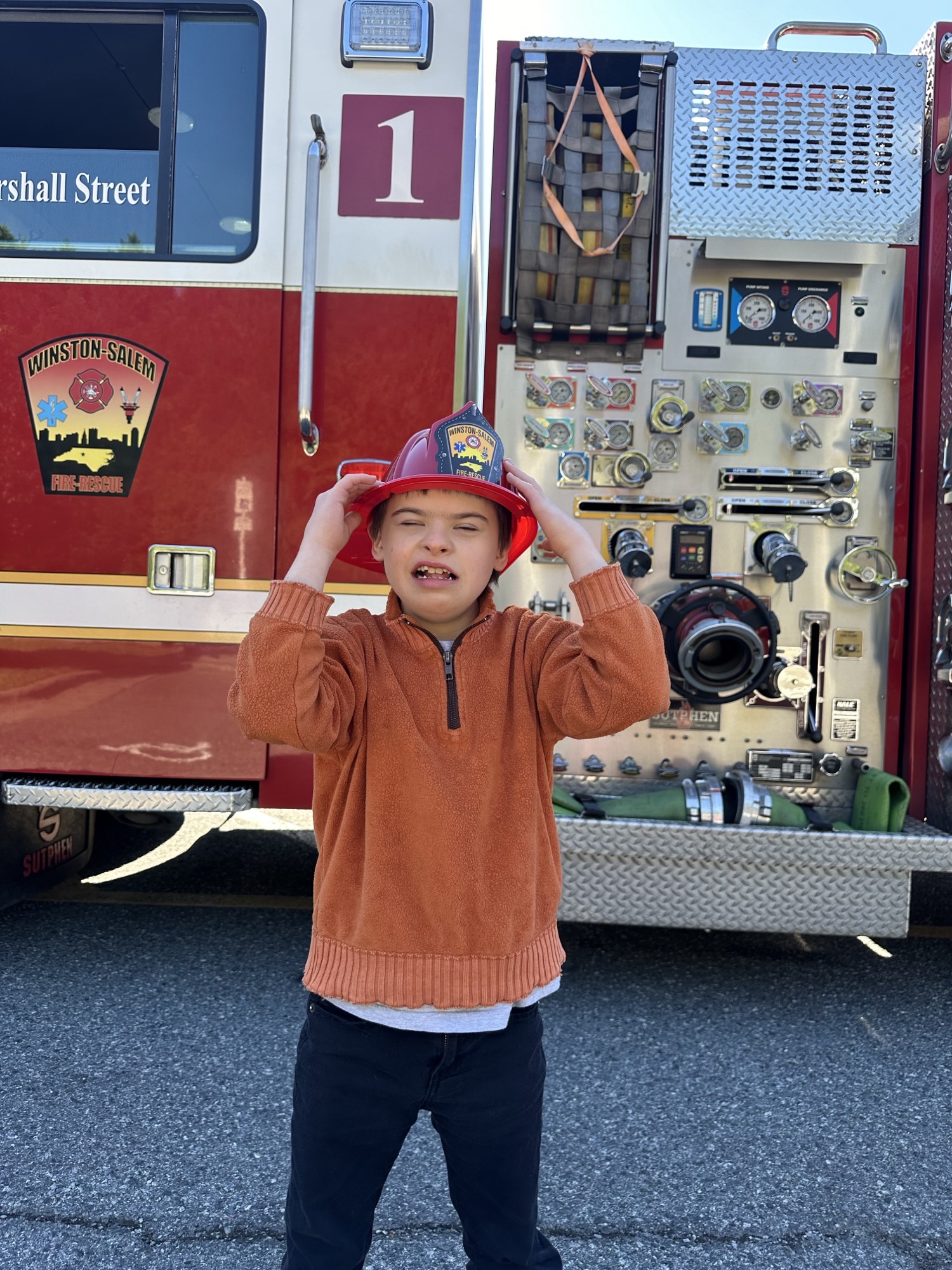 student at fire truck
