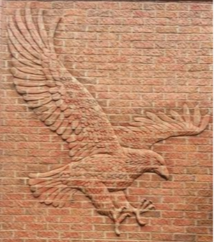 image of a brick relief of a flying eagle