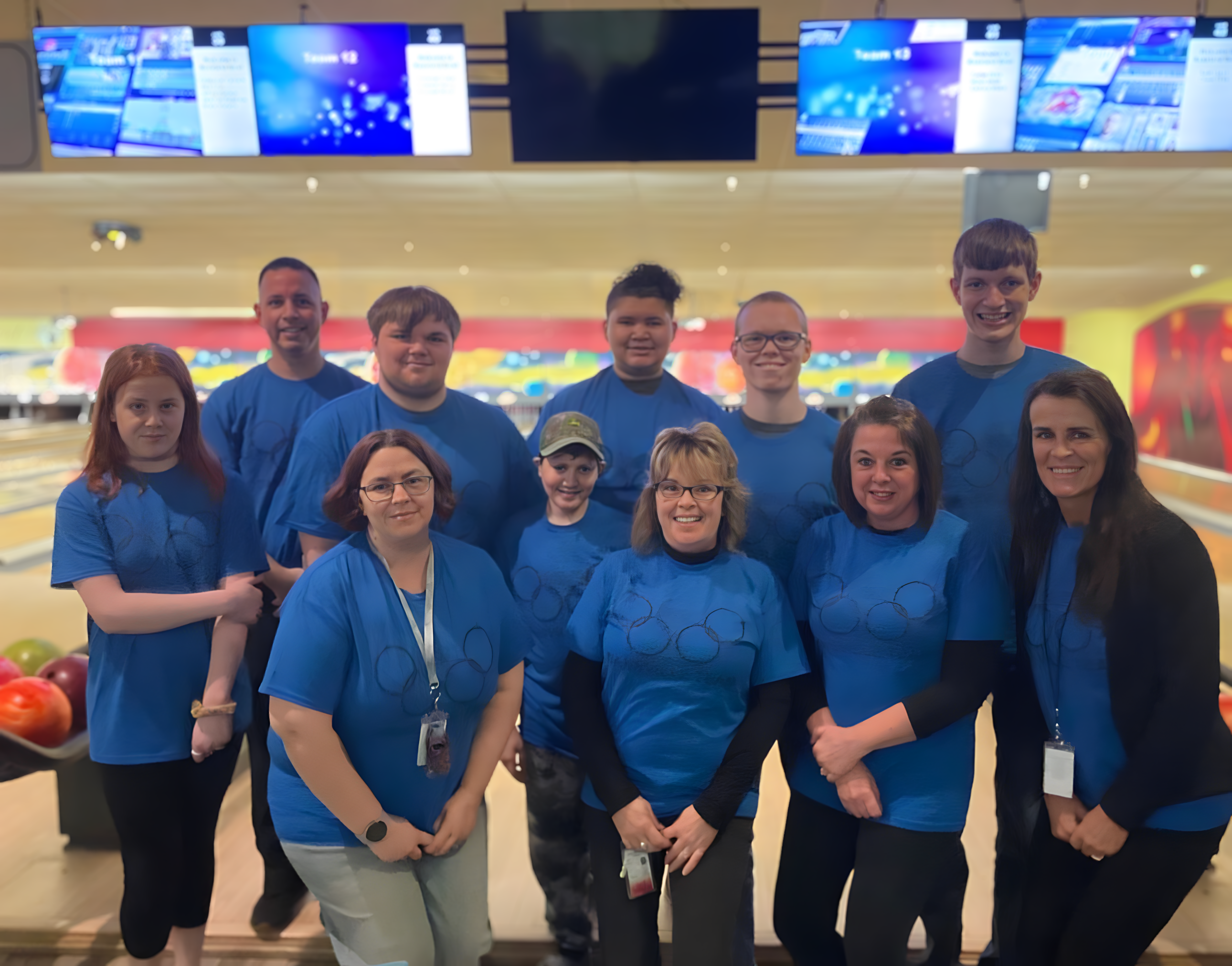 Students and staff at a Special Olympics competition