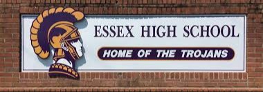 Essex High School sign with the Trojans logo saying Home of the Trojans.