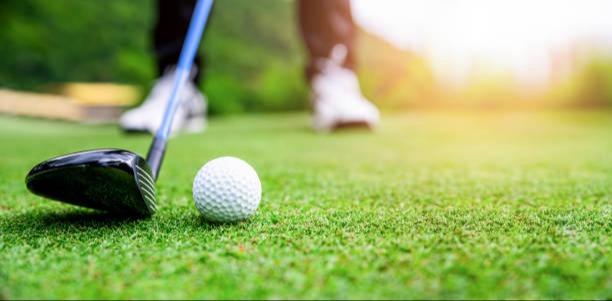 person about to hit a golf put 