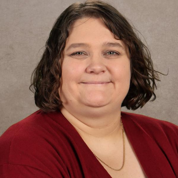 school picture in front of a brown background