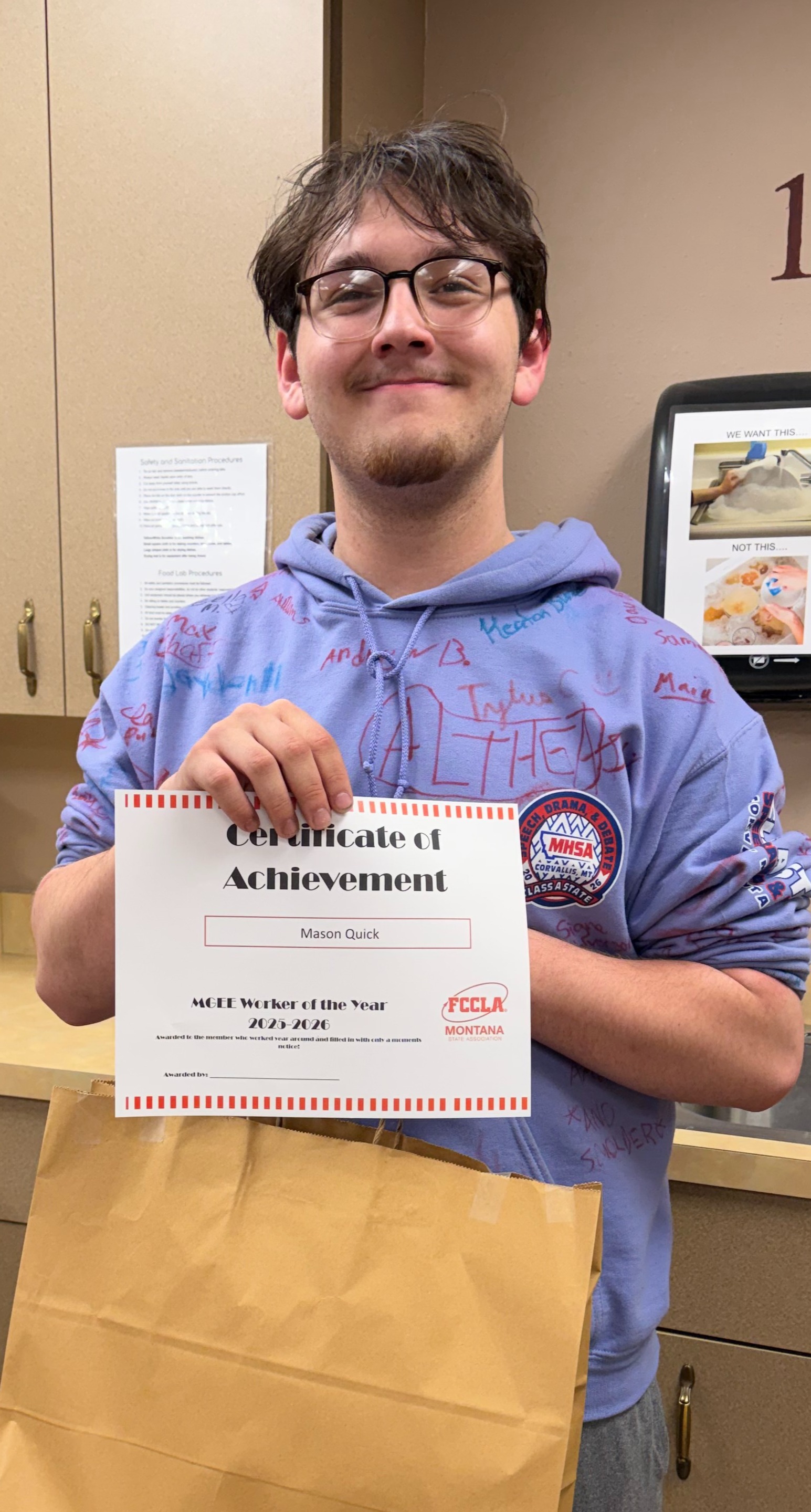 Student with award