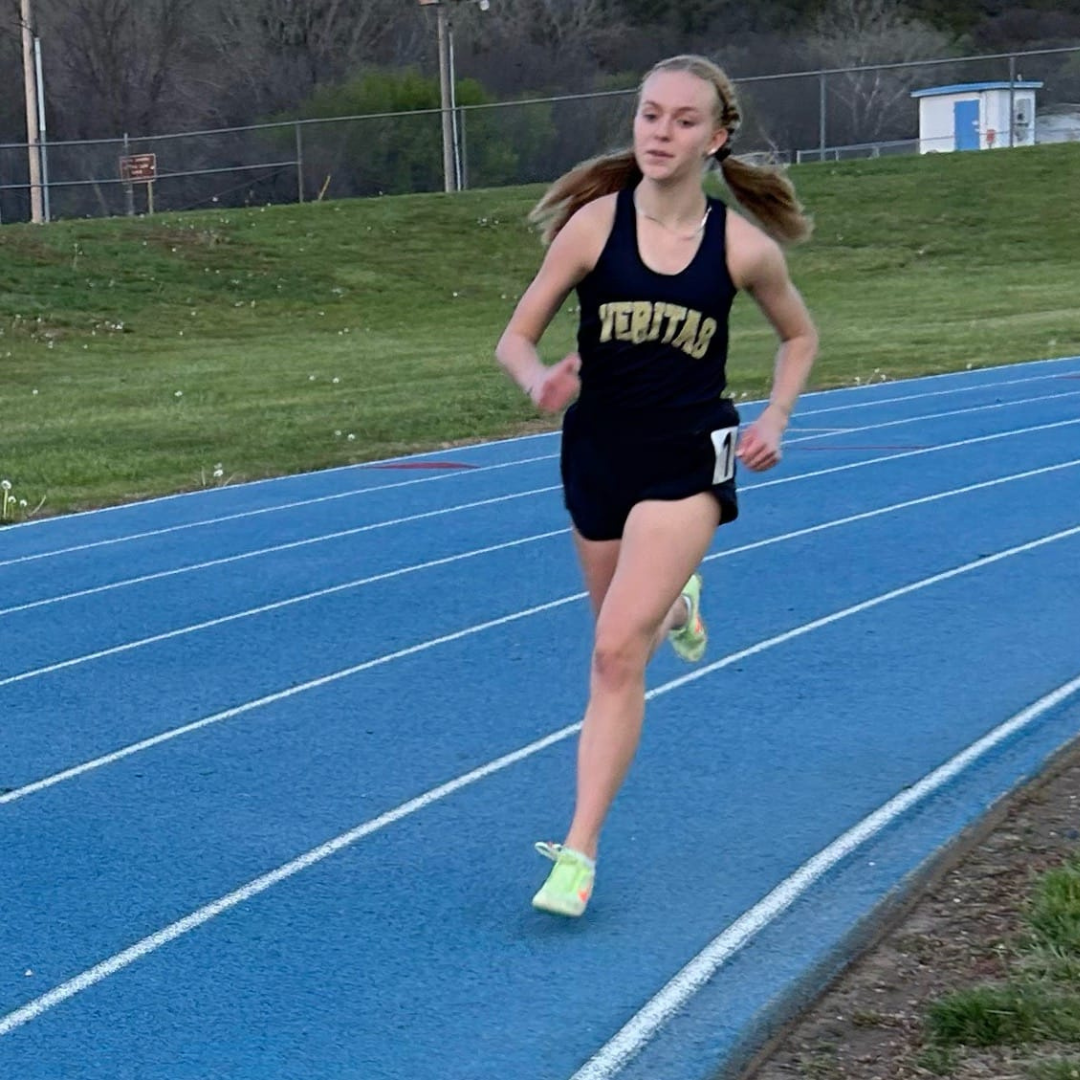 girl running on track