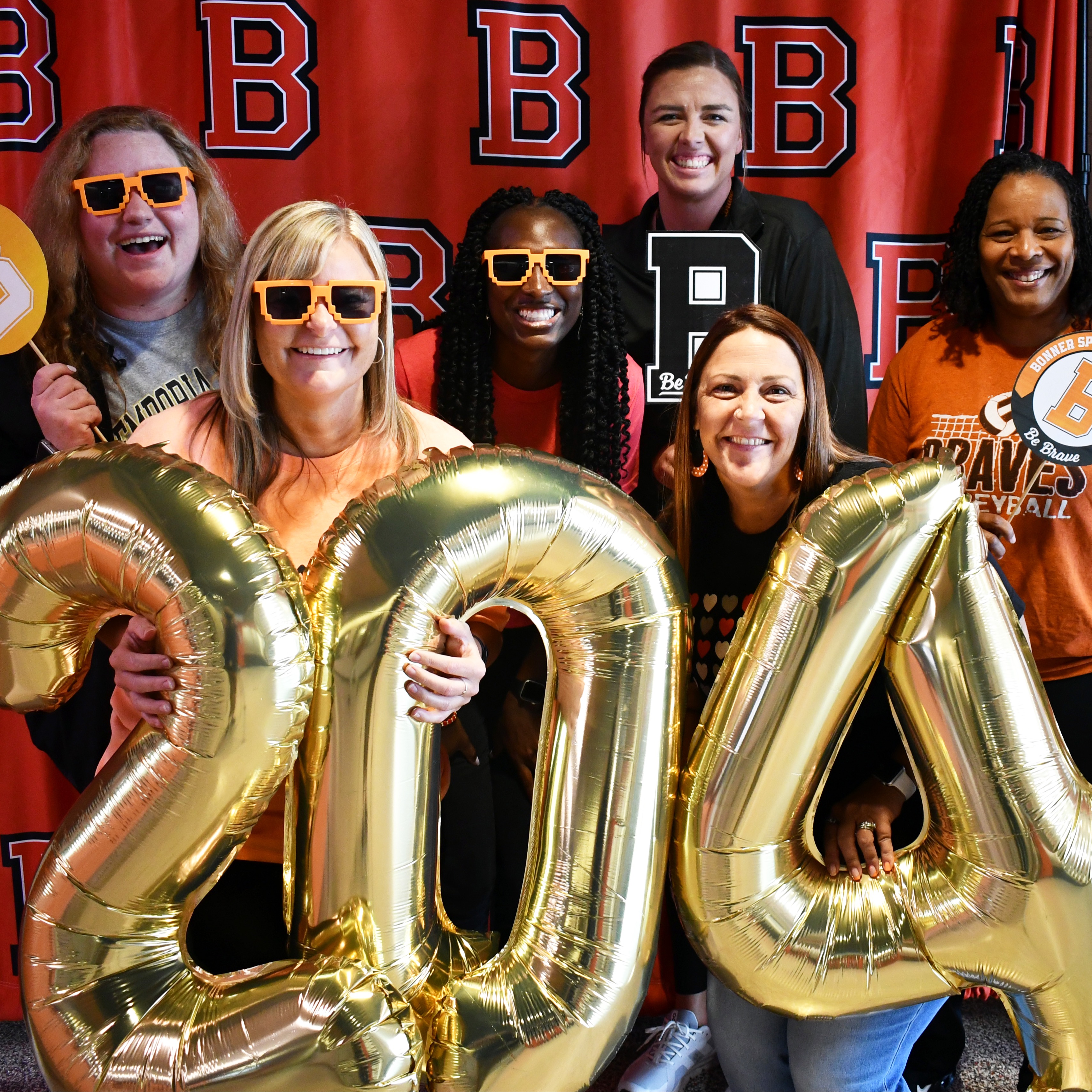 staff in a photo booth 