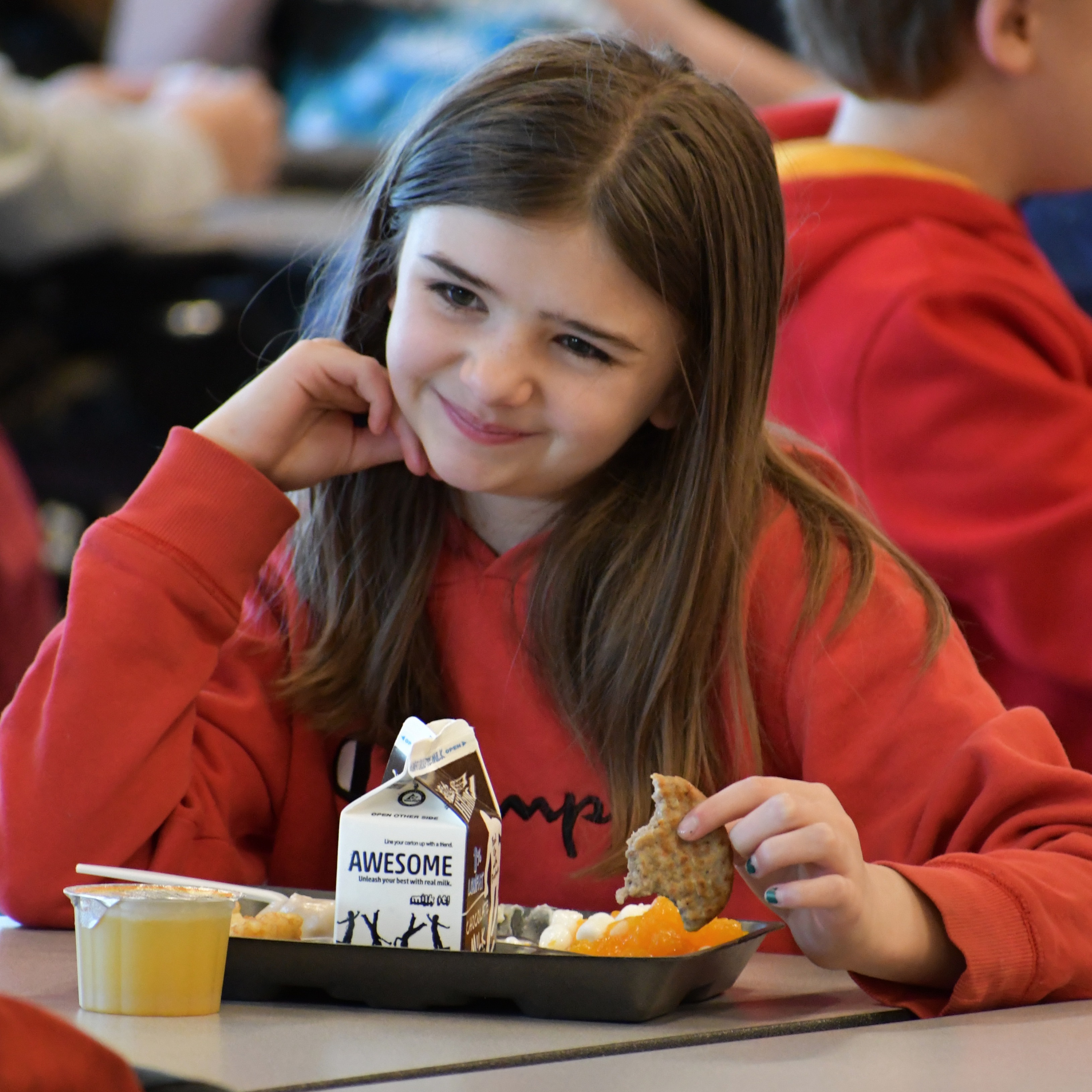 student at the breakfast table