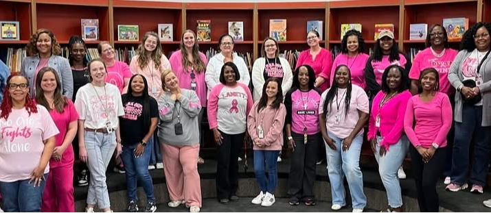 W.O. Lance Staff dressing in pink in honor of breast cancer awareness.