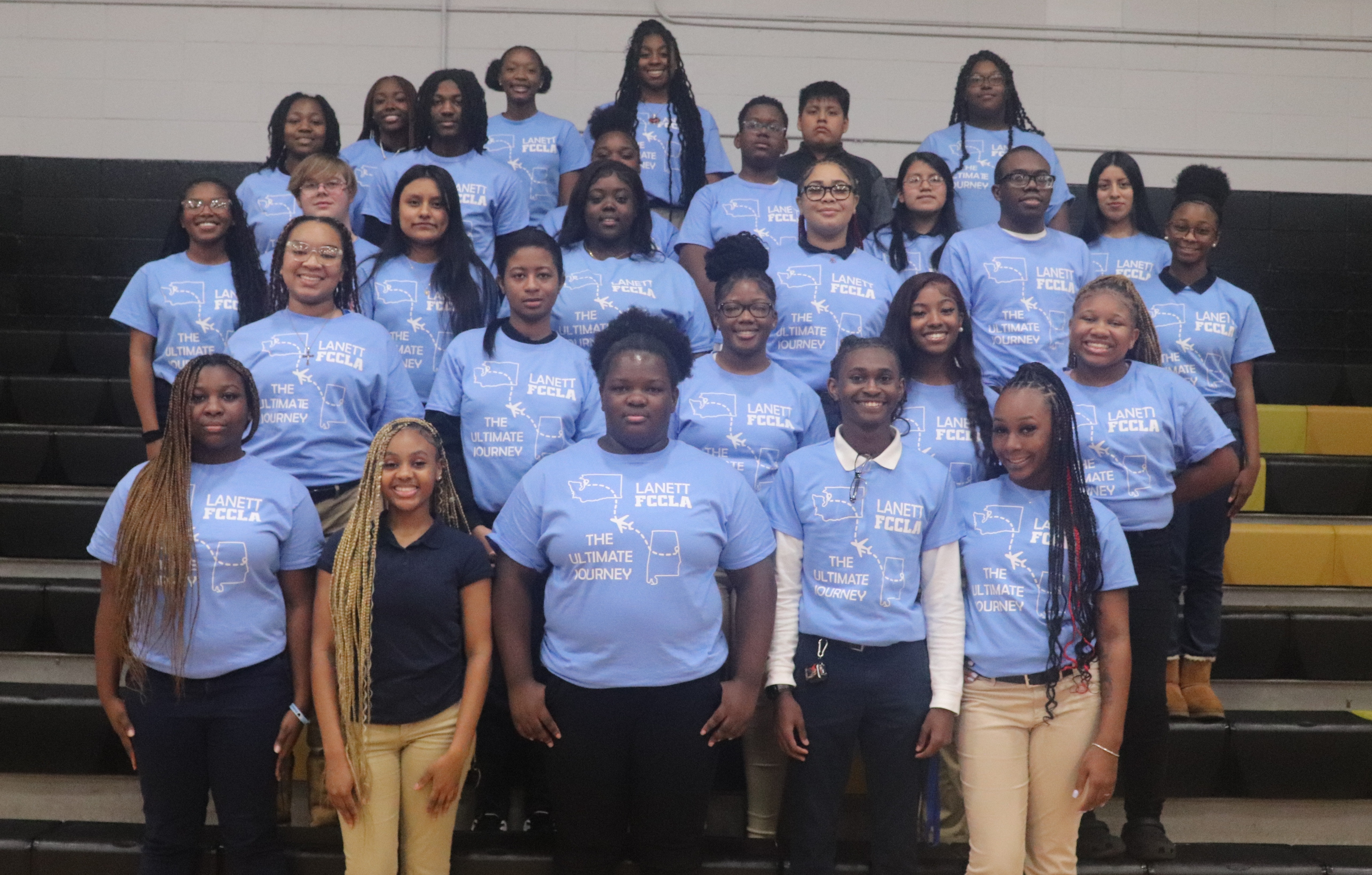 A group picture of the students who are members of the FCCLA club. They are wearing blue shirts.