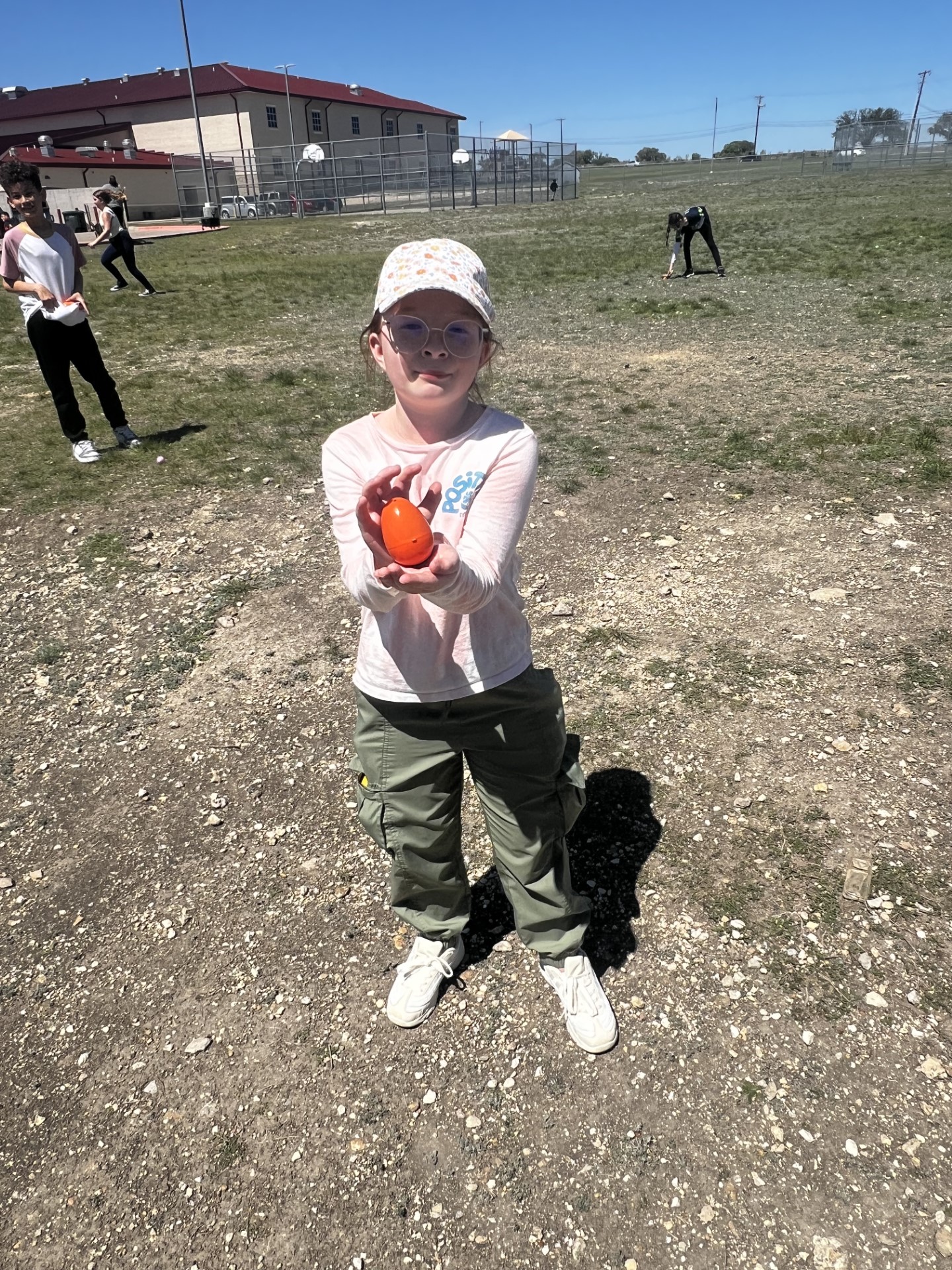 ES2S Student holding a water balloon.