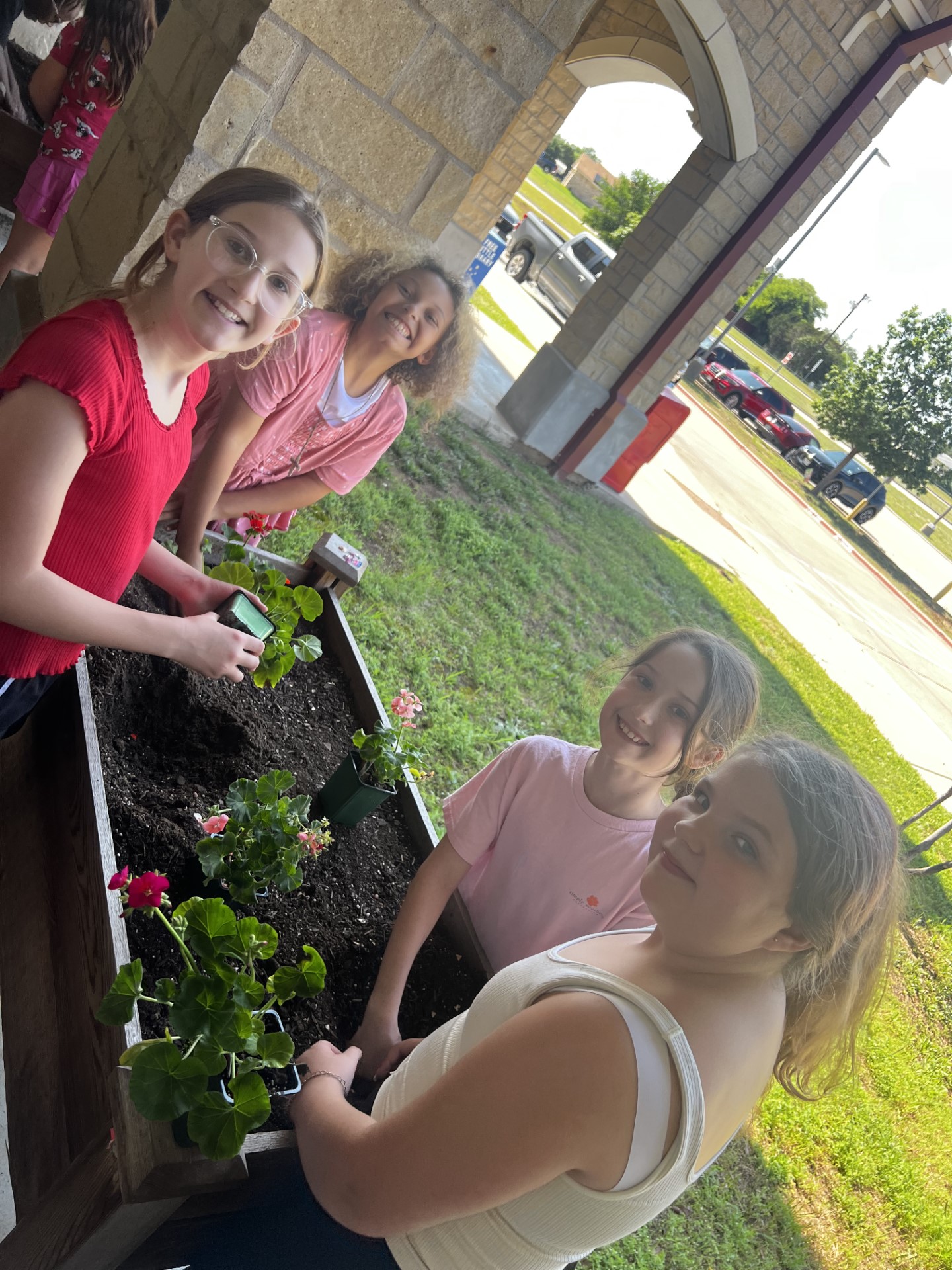 ES2S student plating flowers