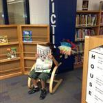 Student reading in the libary