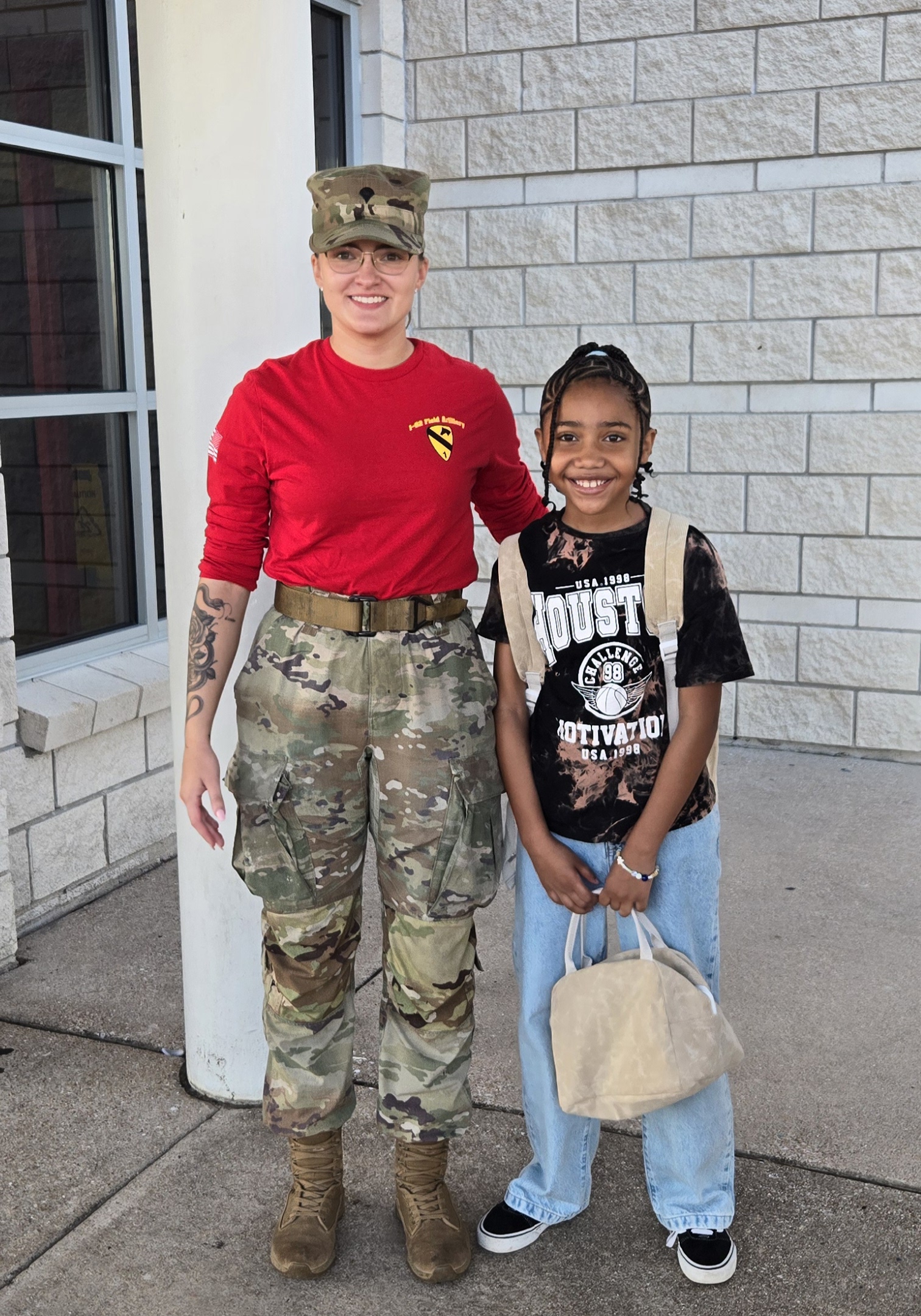 Soldier Posing with Student