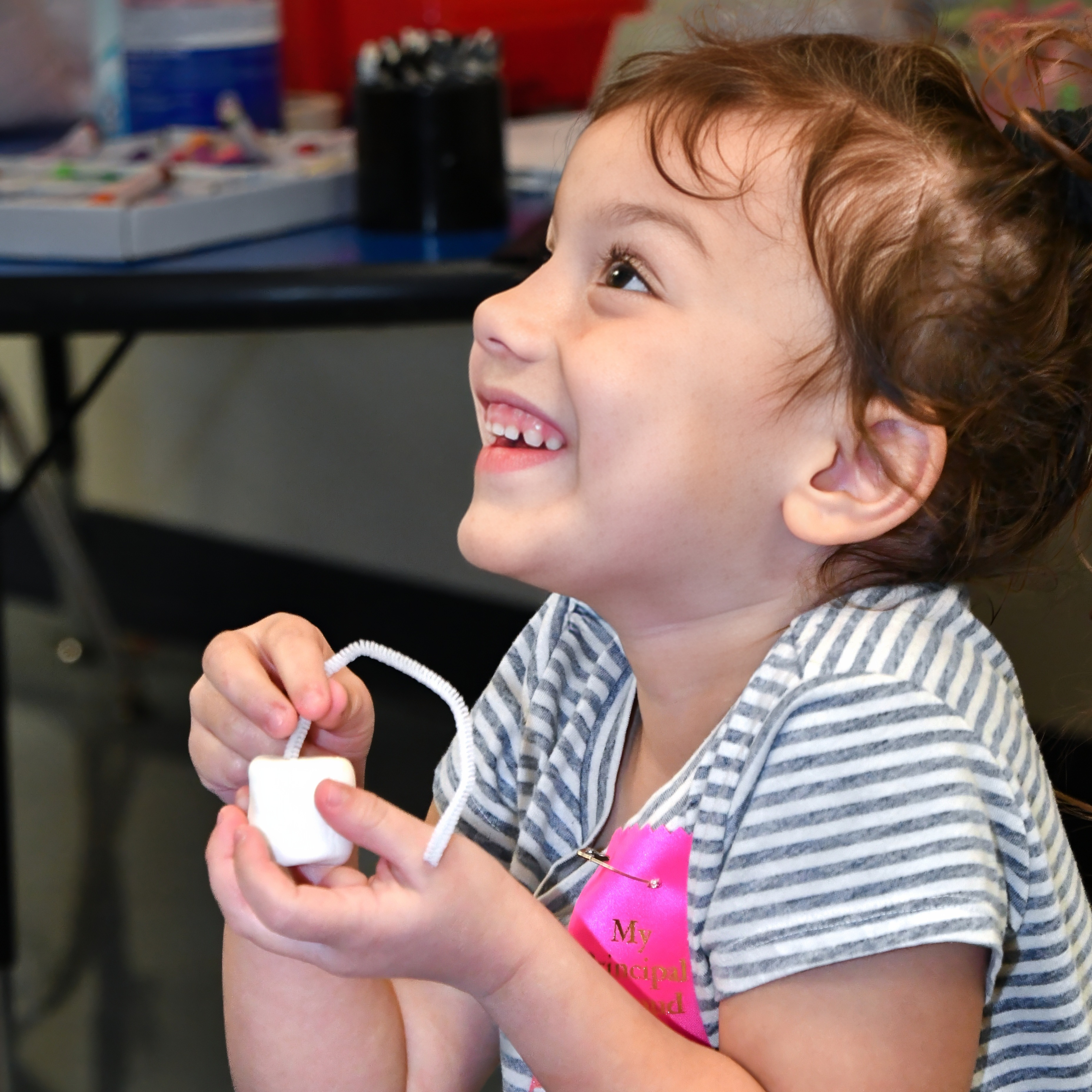 Happy student in a class activity