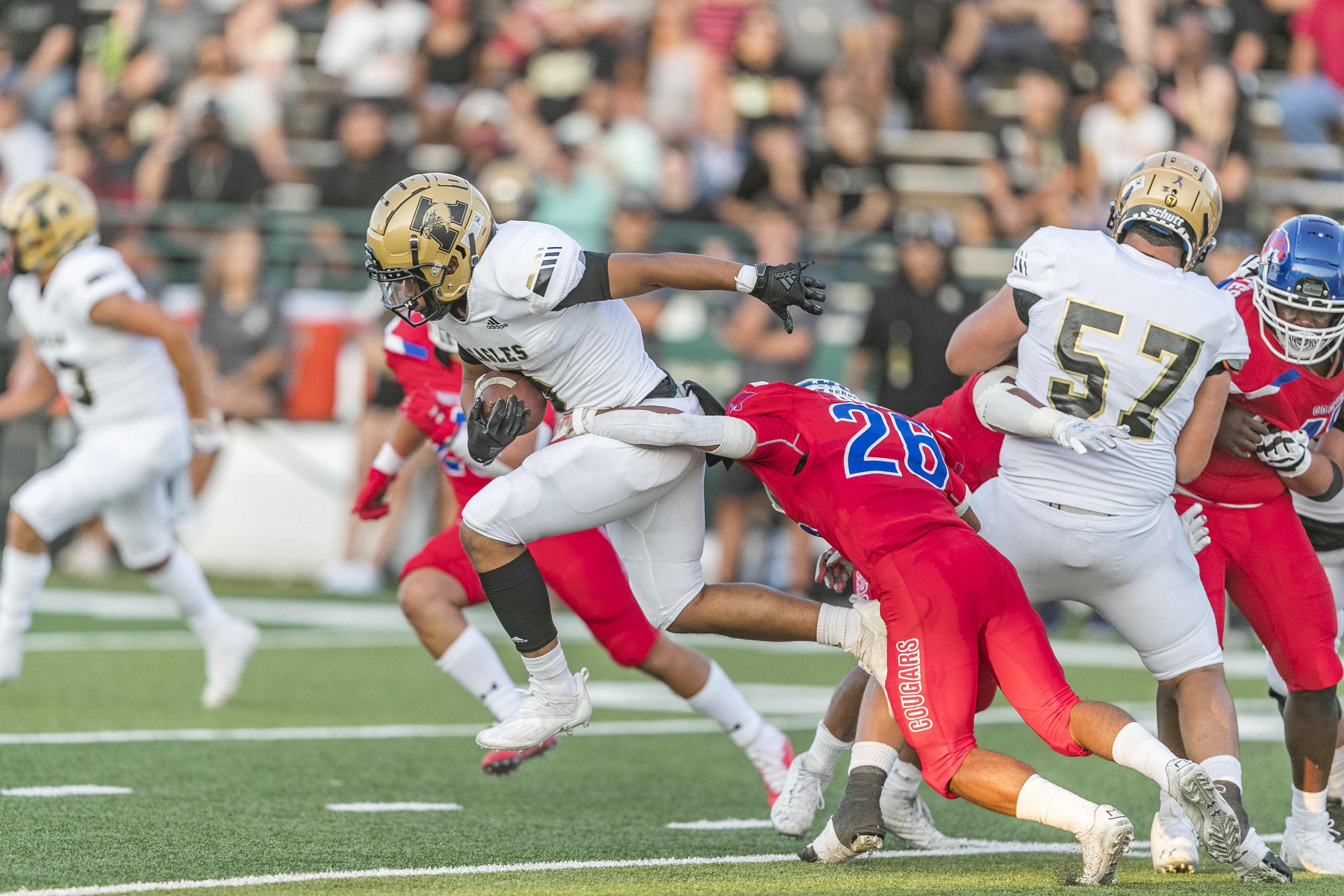 Cooper and Abilene High students face off in a football game