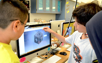 students looking at computer screen