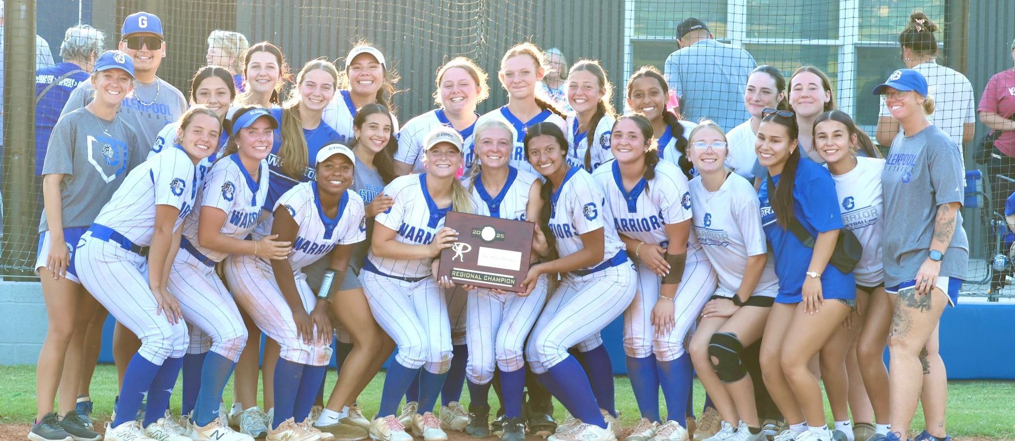 Girls Softball team holding  a plaque