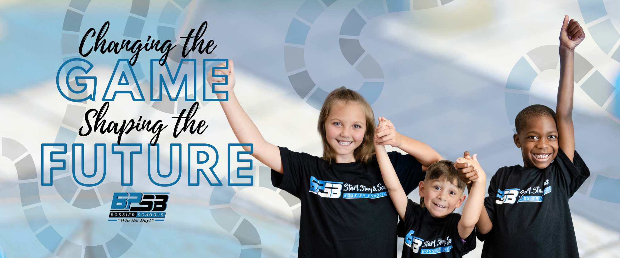 A girl and two boys with their hands in the air "Changing hte Game - Shaping the Future"