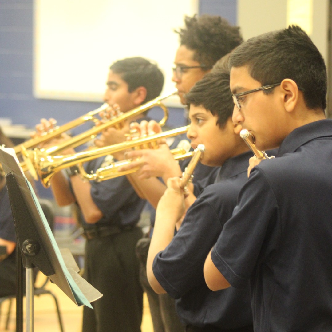 Students playing band instruments