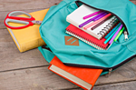 Photo of school supplies inside of backpack