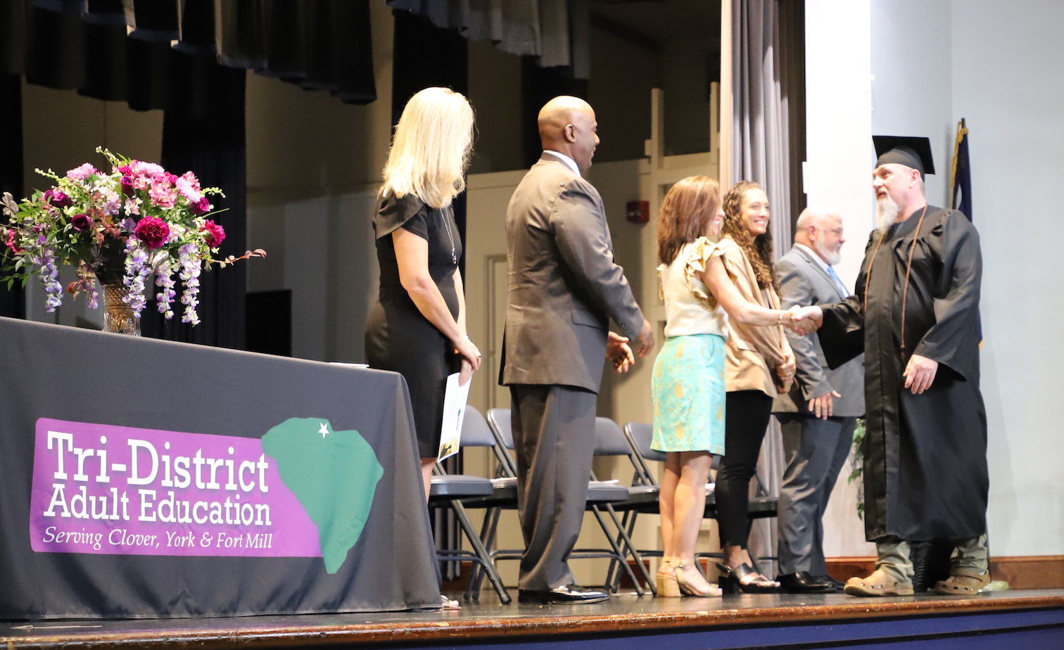 Graduate Shaking Hands